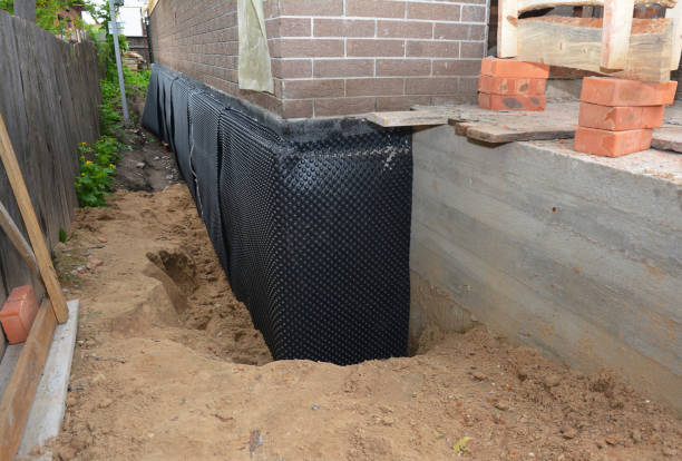 SJ Waterproofing Pros technician performing targeted Exterior Waterproofing assessment in Ramsey, NJ
